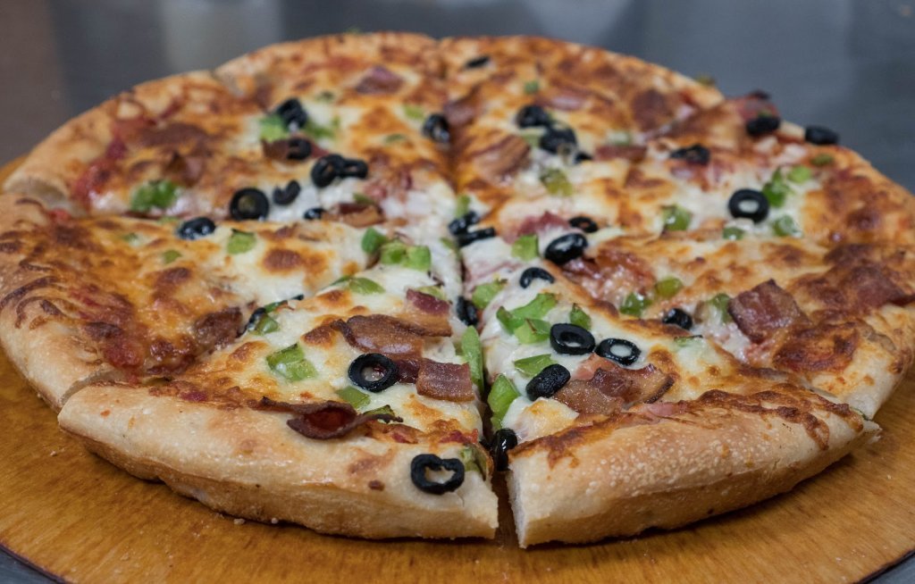 Peninsula Pizza logo