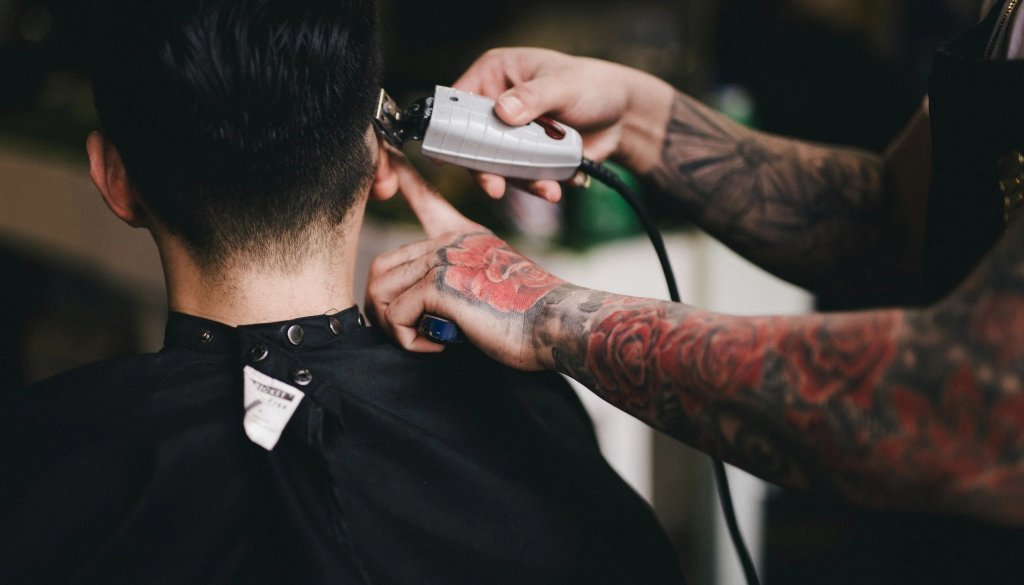 Rebellion Barbershop logo